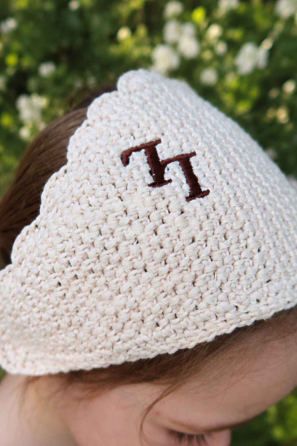 Toddler wearing the Bloom Bandana — 100% organic cotton bandana with embroidered LL initials
