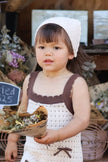 Toddler wearing the Bloom Bandana — 100% organic cotton bandana with embroidered LL initials