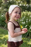 Toddler wearing the Bloom Bandana — 100% organic cotton bandana with embroidered LL initials
