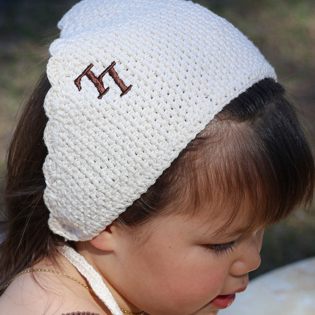 Toddler wearing the Bloom Bandana — 100% organic cotton bandana with embroidered LL initials