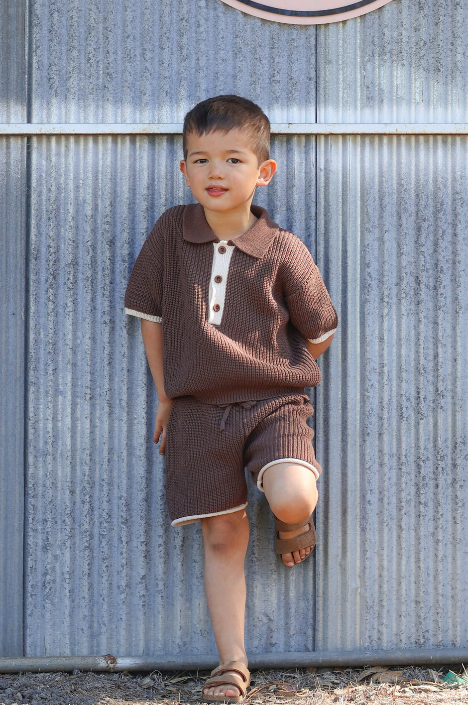 Toddler wearing the Willow Set in Chestnut — boys' 100% organic cotton knit two-piece with oat detailing